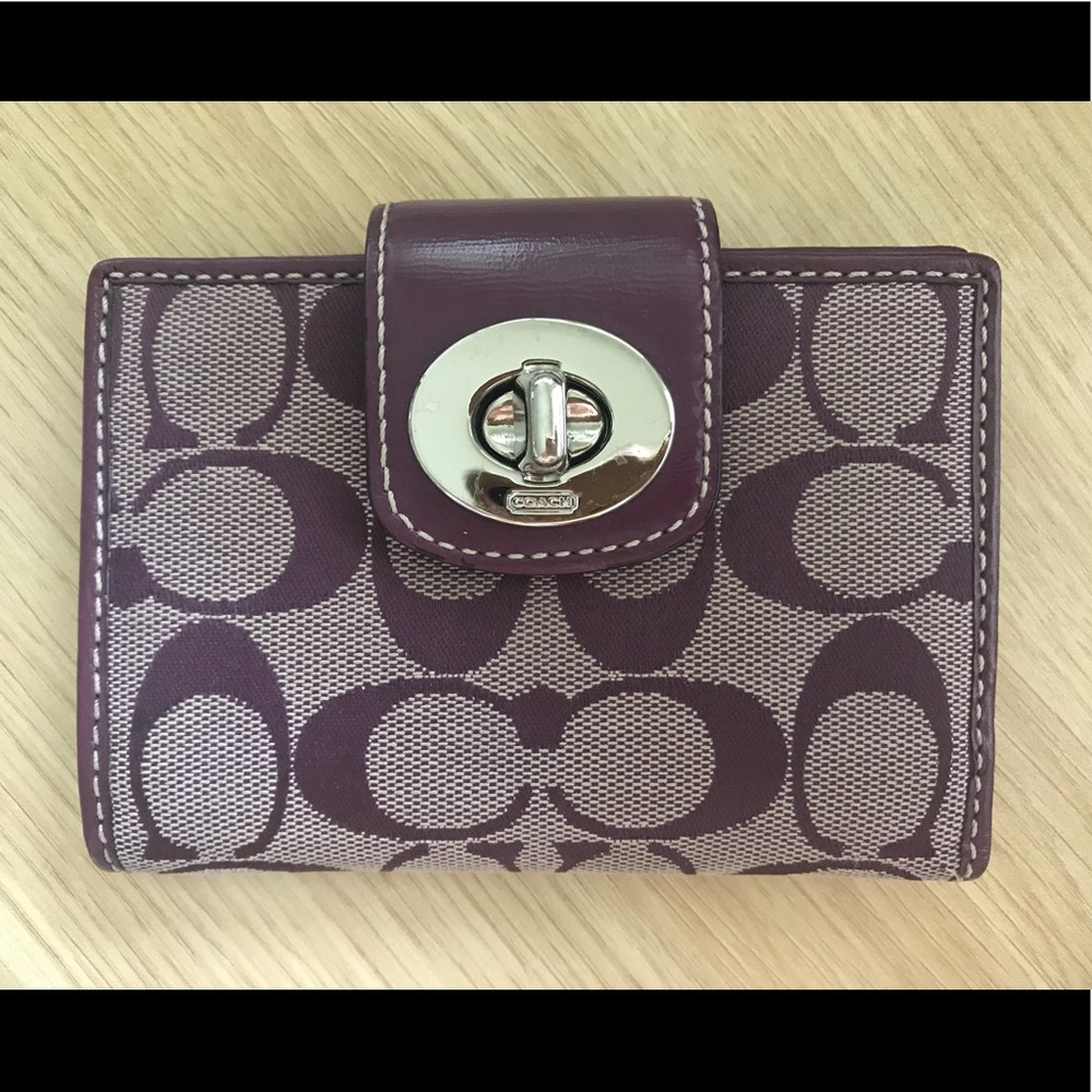 Coach purple monogram zip wallet turn lock